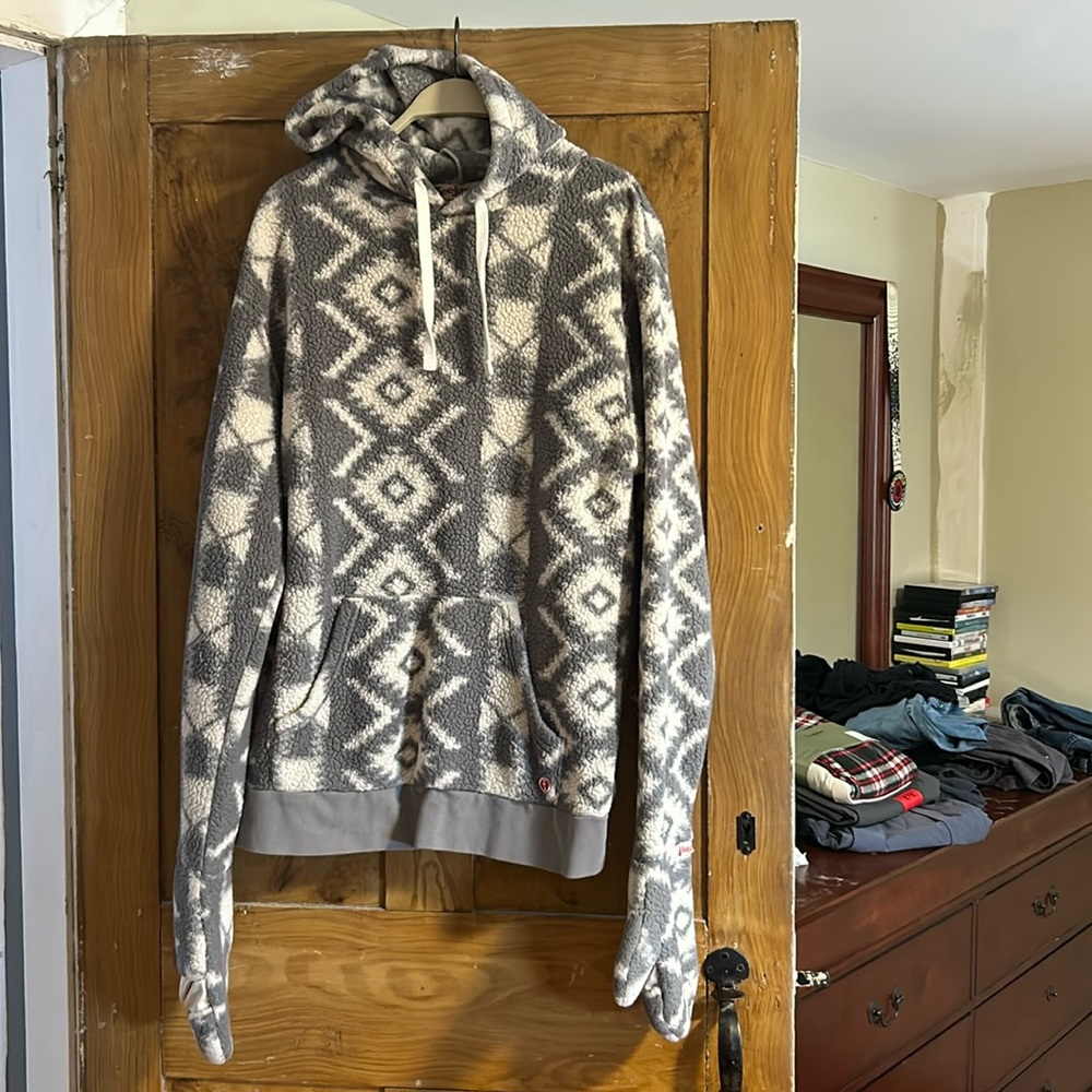 Fleece sweatshirt with gloves attached